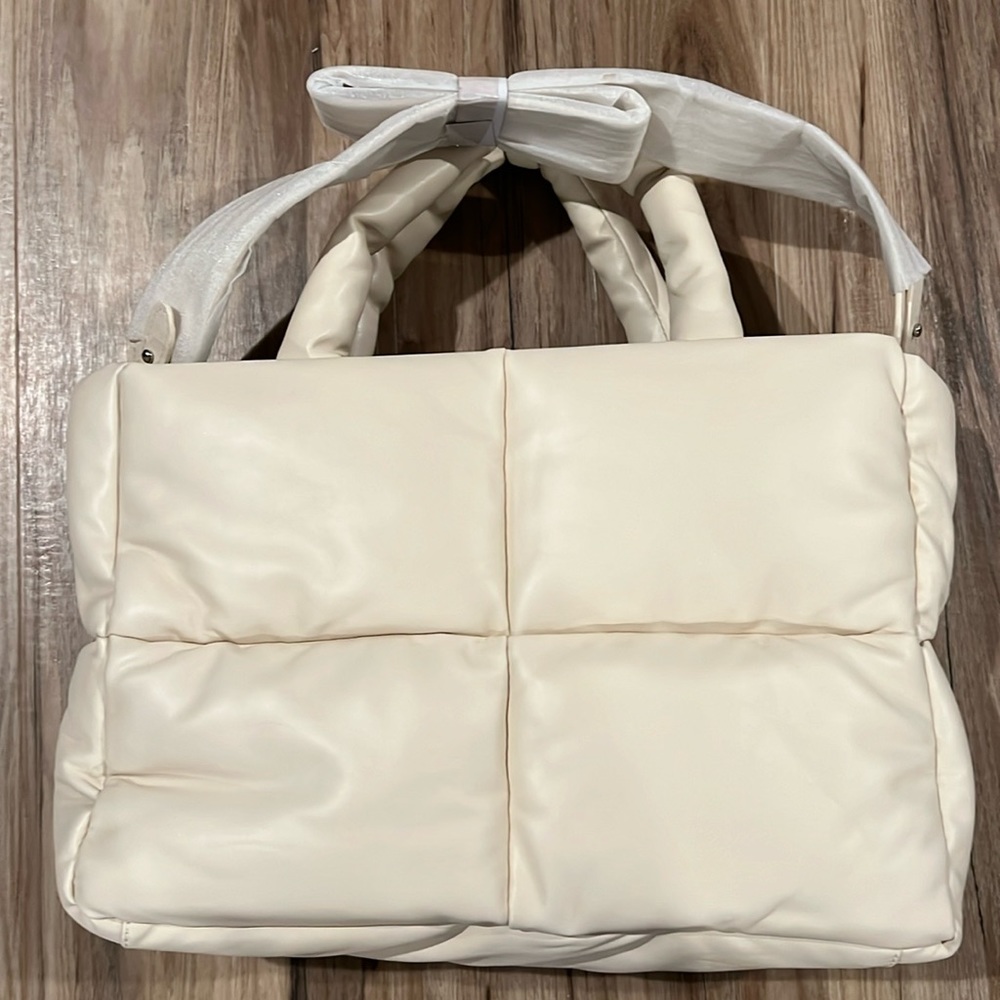Cream puffer bag